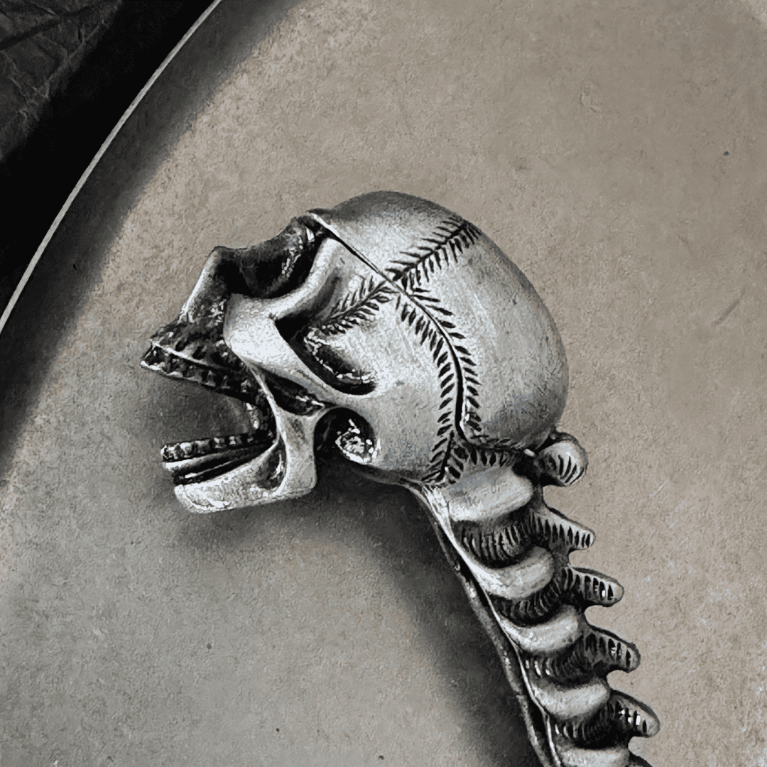 Zinc alloy gothic skull bottle opener side view