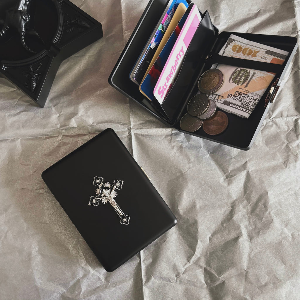 Versatile black metal organizer available as a cigarette case or card holder