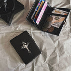 Versatile black metal organizer available as a cigarette case or card holder